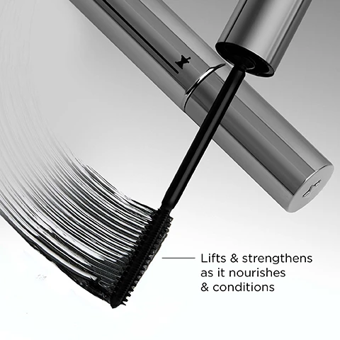 Image 1 - A silver mascara tube is open with its brush covered in black mascara, making black strokes on a white background, next to text that reads Lifts & strengthens as it nourishes & conditions. Image 2 - A beauty product image features before and after photos of an eye showcasing mascara application, a black mascara tube and wand, and black mascara texture, with text that reads 92% said their lashes looked fuller, longer & lifted immediately after application* In a consumer study of 54 women after 28 days. BEFORE. AFTER APPLICATION.