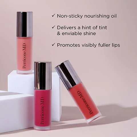 Three tubes of Perricone MD lip gloss in light pink, dark pink, and red-orange shades with silver caps are displayed on white blocks, accompanied by text that reads Non-sticky nourishing oil, Delivers a hint of tint & enviable shine, Promotes visibly fuller lips.